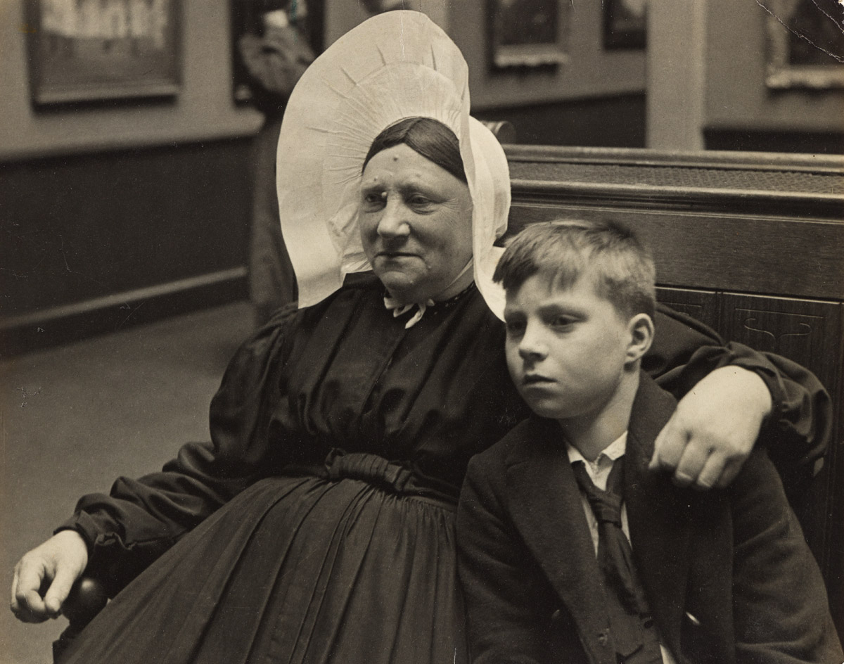 ALFRED EISENSTAEDT (1898-1995) Woman and Grandson Viewing Rembrandts Night Watch, Rijksmuseum, Amsterdam.